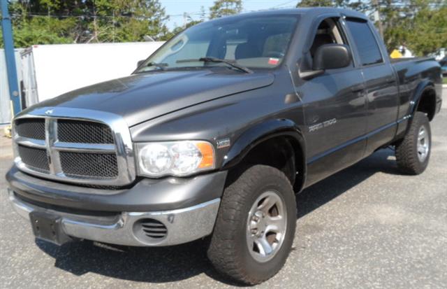 2004 Dodge Ram 1500 4dr Quad Cab 140.5" WB 4WD SLT, available for sale in Patchogue, New York | Romaxx Truxx. Patchogue, New York