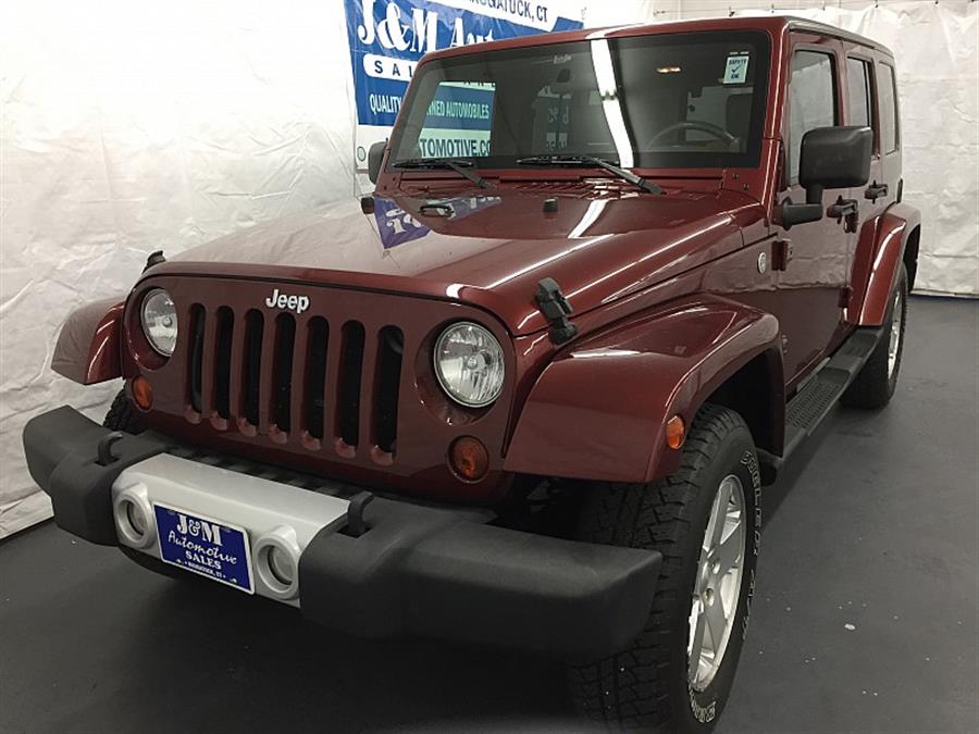 2010 Jeep Wrangler Unlimited 4d Convertible 4WD Sahara, available for sale in Naugatuck, Connecticut | J&M Automotive Sls&Svc LLC. Naugatuck, Connecticut