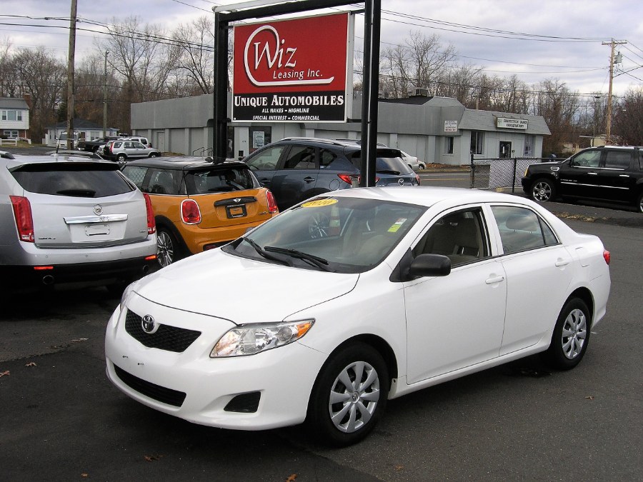 2010 Toyota Corolla 4dr Sdn Man (Natl), available for sale in Stratford, Connecticut | Wiz Leasing Inc. Stratford, Connecticut