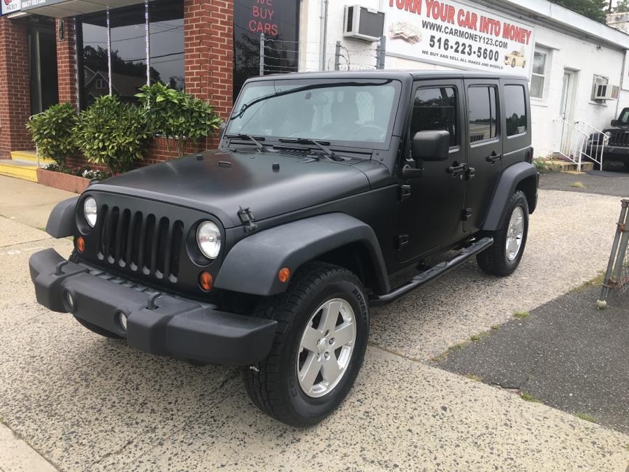 2010 Jeep Wrangler Unlimited 4WD 4dr Sport, available for sale in Baldwin, New York | Carmoney Auto Sales. Baldwin, New York