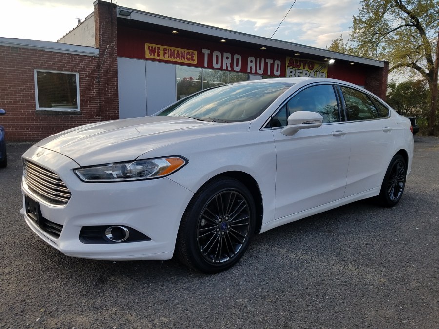 2013 Ford Fusion 4dr Sdn SE FWD Leather, available for sale in East Windsor, Connecticut | Toro Auto. East Windsor, Connecticut