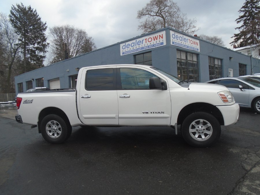 2006 Nissan Titan SE Crew Cab 4WD, available for sale in Milford, Connecticut | Dealertown Auto Wholesalers. Milford, Connecticut