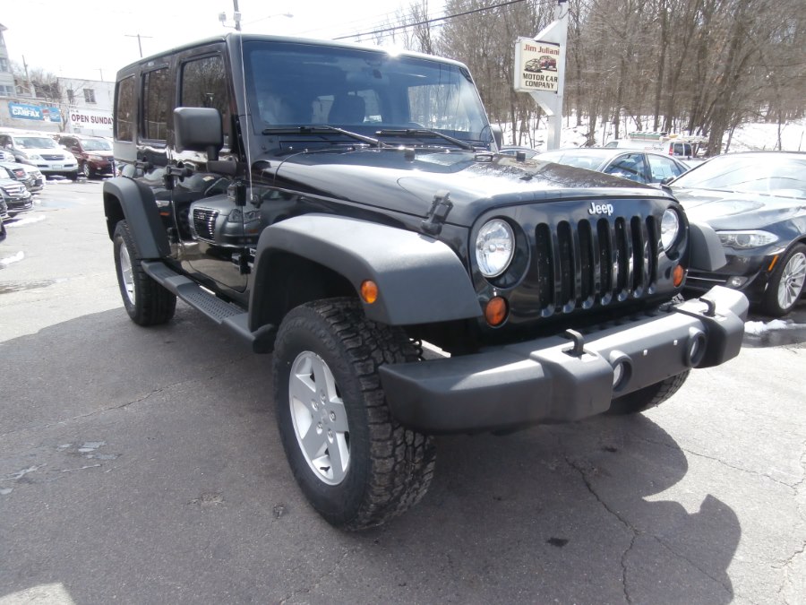 2011 Jeep Wrangler Unlimited 4WD 4dr Sport, available for sale in Waterbury, Connecticut | Jim Juliani Motors. Waterbury, Connecticut