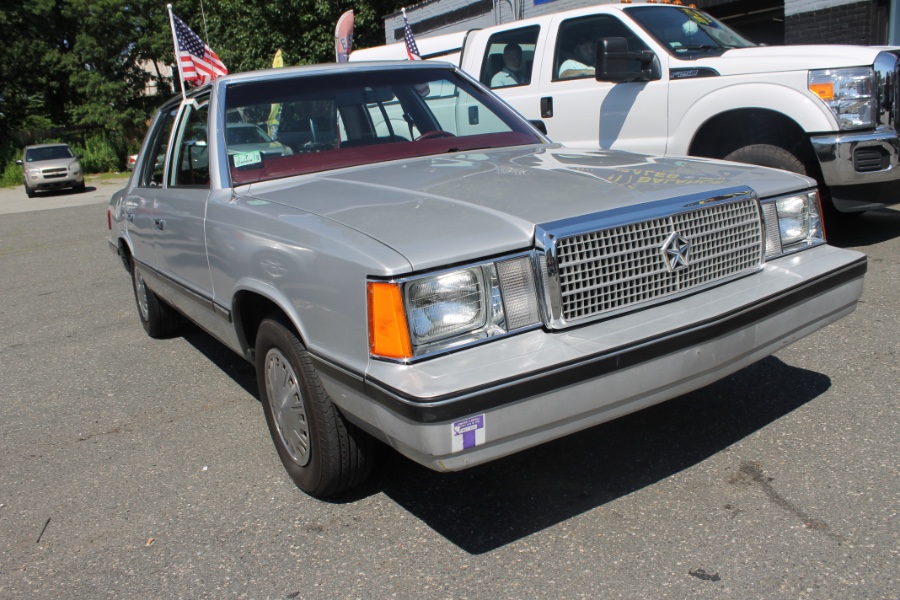 1984 Plymouth Reliant 4dr Sedan, available for sale in Chicopee, Massachusetts | AlAnsari Auto Sales & Repair . Chicopee, Massachusetts