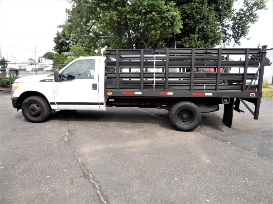 2012 Ford Super Duty F-350 12-FT STAKE BODY 2WD Reg Cab 165" WB 84" CA XL, available for sale in COPIAGUE, New York | Warwick Auto Sales Inc. COPIAGUE, New York