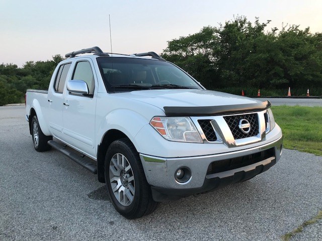 2010 Nissan Frontier 4WD Crew Cab LWB Auto SE, available for sale in Jamaica, New York | Jamaica Motor Sports . Jamaica, New York