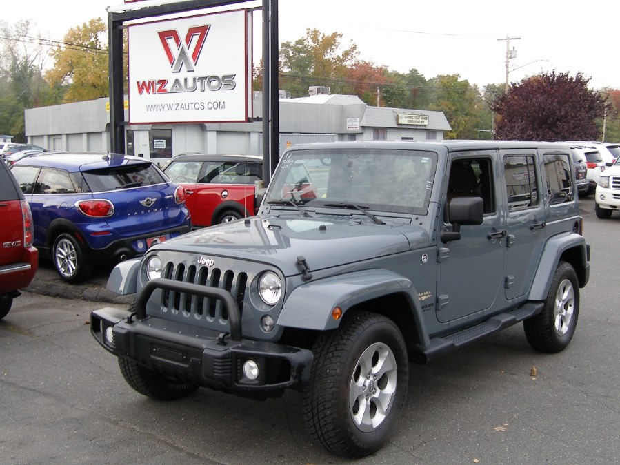 2014 Jeep Wrangler Unlimited 4WD 4dr Sahara, available for sale in Stratford, Connecticut | Wiz Leasing Inc. Stratford, Connecticut