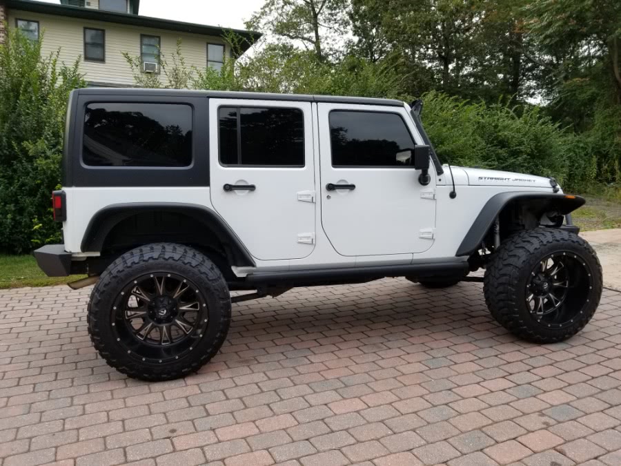2015 Jeep Wrangler Unlimited 4WD 4dr Sahara, available for sale in Tampa, Florida | 0 to 60 Motorsports. Tampa, Florida