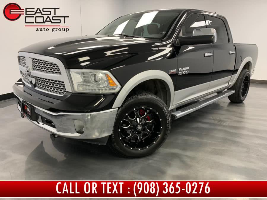 2013 Ram 1500 4WD Crew Cab 140.5" Laramie, available for sale in Linden, New Jersey | East Coast Auto Group. Linden, New Jersey