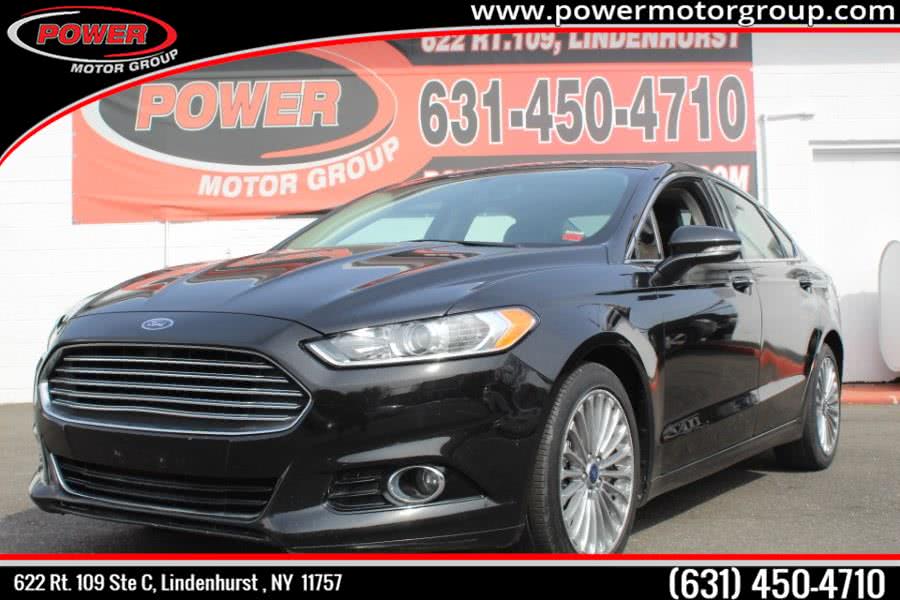 2014 Ford Fusion 4dr Sdn Titanium FWD, available for sale in Lindenhurst, New York | Power Motor Group. Lindenhurst, New York