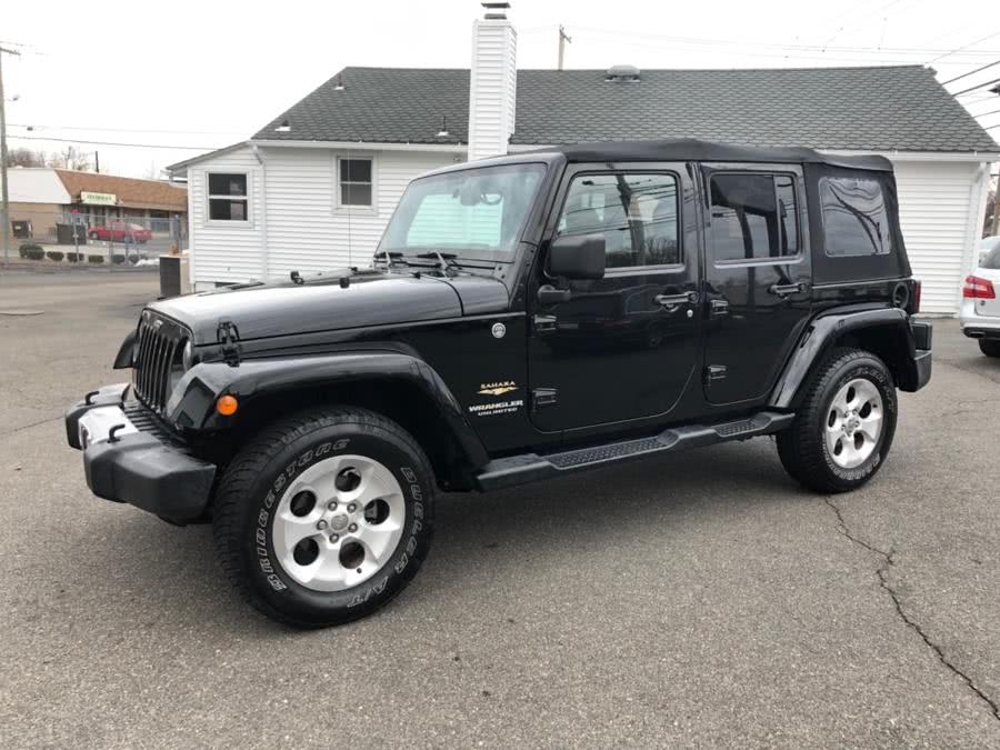 2013 Jeep Wrangler Unlimited 4WD 4dr Sahara, available for sale in Milford, Connecticut | Chip's Auto Sales Inc. Milford, Connecticut