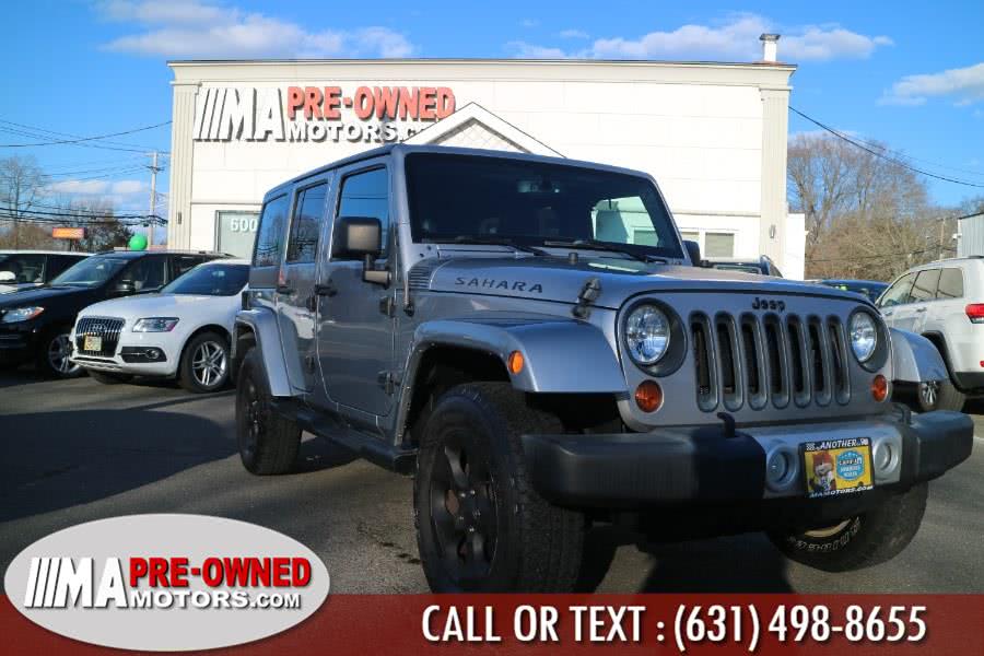 2013 Jeep Wrangler Unlimited 4WD 4dr Sahara, available for sale in Huntington Station, New York | M & A Motors. Huntington Station, New York