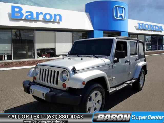 2012 Jeep Wrangler Unlimited Sahara, available for sale in Patchogue, New York | Baron Supercenter. Patchogue, New York