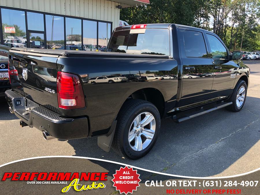 2014 Ram 1500 4WD Crew Cab 140.5" Sport, available for sale in Bohemia, New York | Performance Auto Inc. Bohemia, New York 2014 Ram 1500 4WD Crew Cab 140.5" Sport, available for sale in Bohemia, New York | Performance Auto Inc. Bohemia, New York