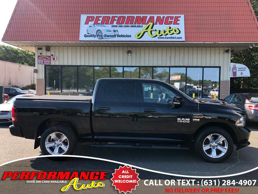 2014 Ram 1500 4WD Crew Cab 140.5" Sport, available for sale in Bohemia, New York | Performance Auto Inc. Bohemia, New York 2014 Ram 1500 4WD Crew Cab 140.5" Sport, available for sale in Bohemia, New York | Performance Auto Inc. Bohemia, New York