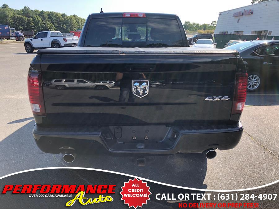 2014 Ram 1500 4WD Crew Cab 140.5" Sport, available for sale in Bohemia, New York | Performance Auto Inc. Bohemia, New York 2014 Ram 1500 4WD Crew Cab 140.5" Sport, available for sale in Bohemia, New York | Performance Auto Inc. Bohemia, New York