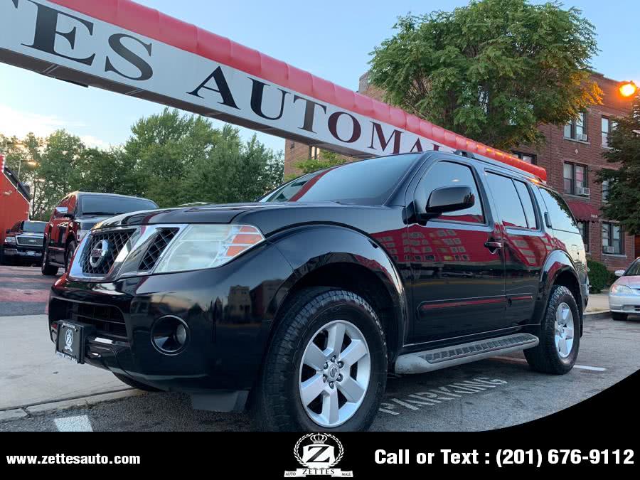 2011 Nissan Pathfinder 4WD 4dr V6 LE, available for sale in Jersey City, New Jersey | Zettes Auto Mall. Jersey City, New Jersey