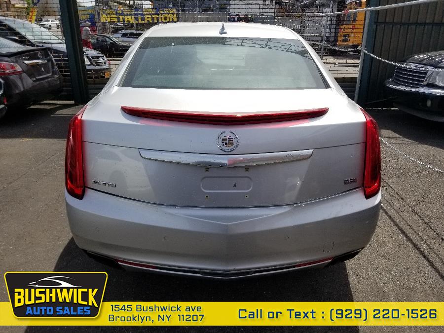 2013 Cadillac XTS 4dr Sdn Platinum FWD, available for sale in Brooklyn, New York | Bushwick Auto Sales LLC. Brooklyn, New York 2013 Cadillac XTS 4dr Sdn Platinum FWD, available for sale in Brooklyn, New York | Bushwick Auto Sales LLC. Brooklyn, New York