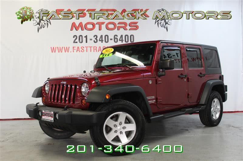 2012 Jeep Wrangler Unlimited SPORT, available for sale in Paterson, New Jersey | Fast Track Motors. Paterson, New Jersey