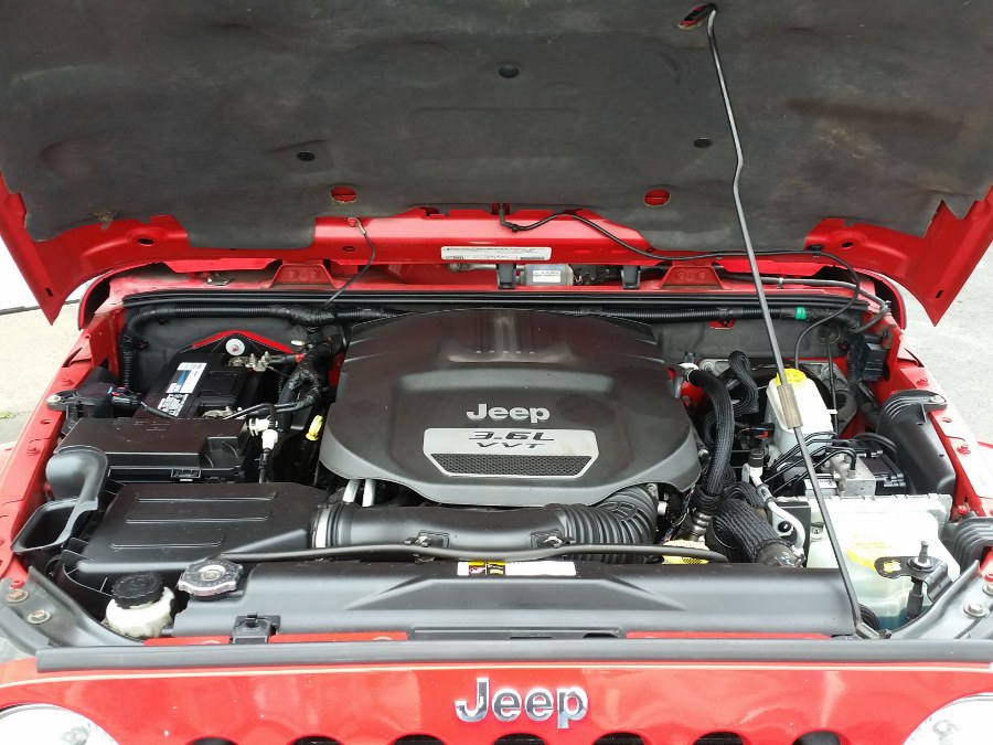 2012 Jeep Wrangler Unlimited 4WD 4dr Sahara, available for sale in Berlin, Connecticut | Action Automotive. Berlin, Connecticut 2012 Jeep Wrangler Unlimited 4WD 4dr Sahara, available for sale in Berlin, Connecticut | Action Automotive. Berlin, Connecticut