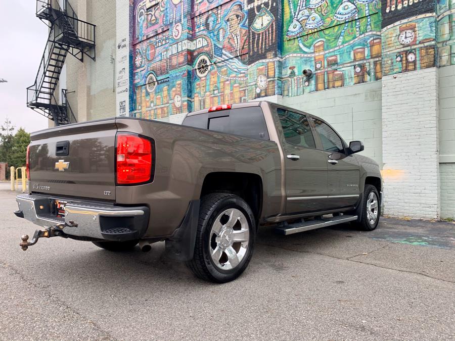 Used Chevrolet Silverado 1500 4WD Crew Cab 143.5" LTZ w/2LZ 2014 | RT Auto Center LLC. Newark, New Jersey Used Chevrolet Silverado 1500 4WD Crew Cab 143.5" LTZ w/2LZ 2014 | RT Auto Center LLC. Newark, New Jersey