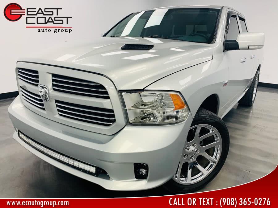 2013 Ram 1500 4WD Quad Cab 140.5" SLT, available for sale in Linden, New Jersey | East Coast Auto Group. Linden, New Jersey