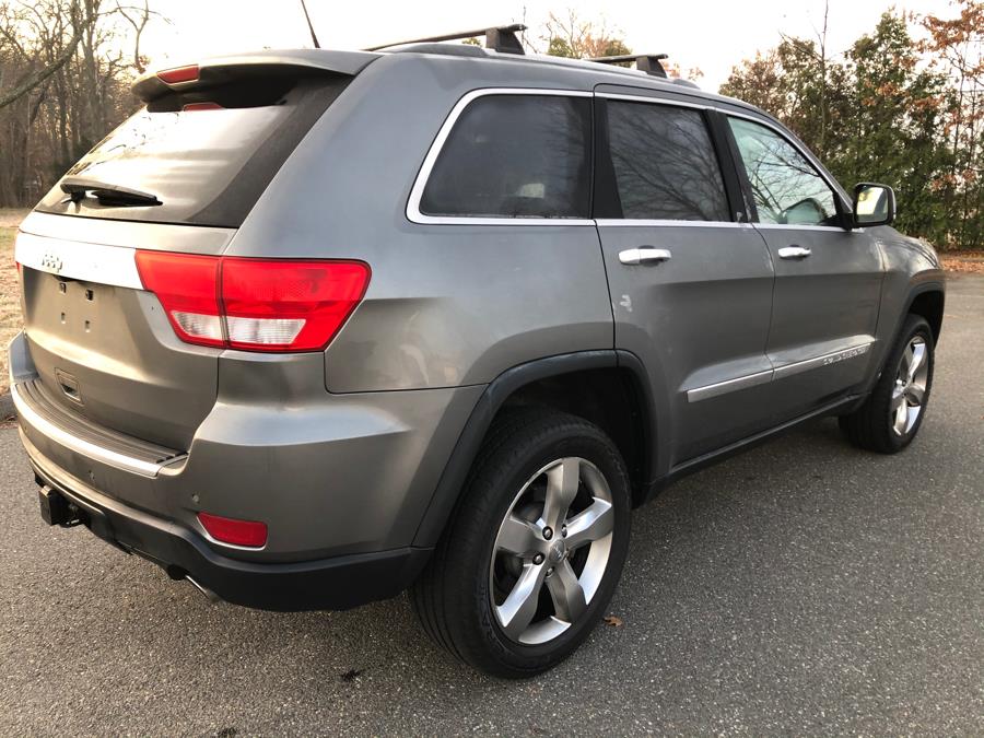 2011 Jeep Grand Cherokee 4WD 4dr Overland Summit, available for sale in Agawam, Massachusetts | Malkoon Motors. Agawam, Massachusetts 2011 Jeep Grand Cherokee 4WD 4dr Overland Summit, available for sale in Agawam, Massachusetts | Malkoon Motors. Agawam, Massachusetts