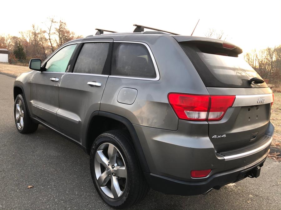 2011 Jeep Grand Cherokee 4WD 4dr Overland Summit, available for sale in Agawam, Massachusetts | Malkoon Motors. Agawam, Massachusetts 2011 Jeep Grand Cherokee 4WD 4dr Overland Summit, available for sale in Agawam, Massachusetts | Malkoon Motors. Agawam, Massachusetts
