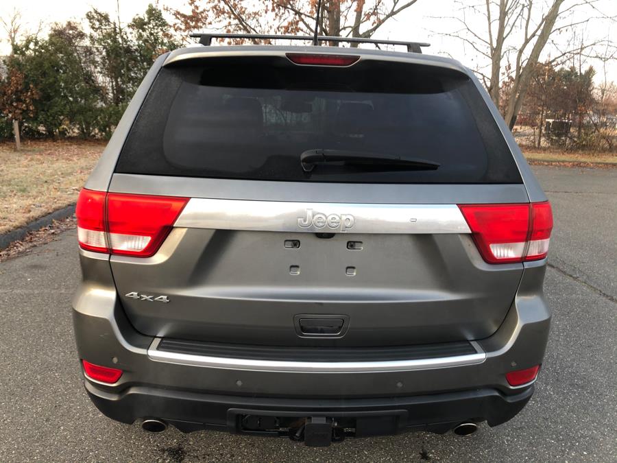 2011 Jeep Grand Cherokee 4WD 4dr Overland Summit, available for sale in Agawam, Massachusetts | Malkoon Motors. Agawam, Massachusetts 2011 Jeep Grand Cherokee 4WD 4dr Overland Summit, available for sale in Agawam, Massachusetts | Malkoon Motors. Agawam, Massachusetts