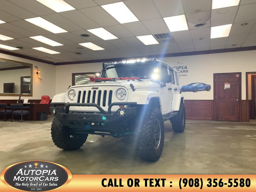 2012 Jeep Wrangler Unlimited 4WD 4dr Sahara, available for sale in Union, New Jersey | Autopia Motorcars Inc. Union, New Jersey