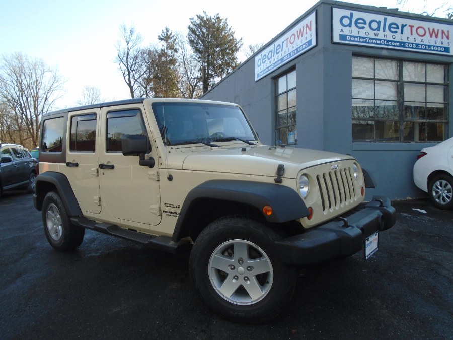 2011 Jeep Wrangler Unlimited 4WD 4dr Sport, available for sale in Milford, Connecticut | Dealertown Auto Wholesalers. Milford, Connecticut 2011 Jeep Wrangler Unlimited 4WD 4dr Sport, available for sale in Milford, Connecticut | Dealertown Auto Wholesalers. Milford, Connecticut