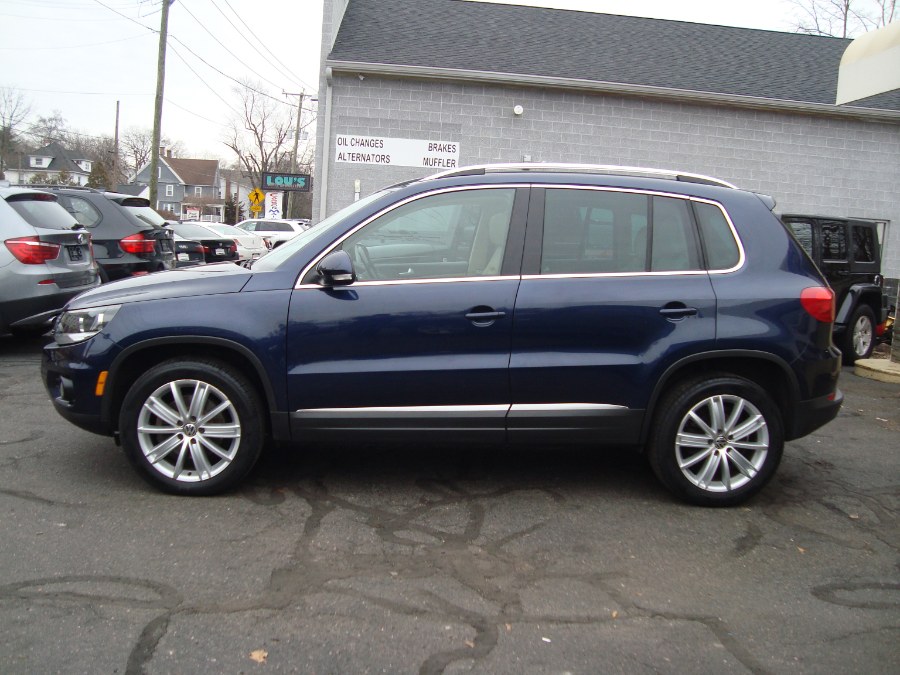 2012 Volkswagen Tiguan 4WD 4dr Auto SE w/Sunroof & Nav, available for sale in Manchester, Connecticut | Yara Motors. Manchester, Connecticut 2012 Volkswagen Tiguan 4WD 4dr Auto SE w/Sunroof & Nav, available for sale in Manchester, Connecticut | Yara Motors. Manchester, Connecticut