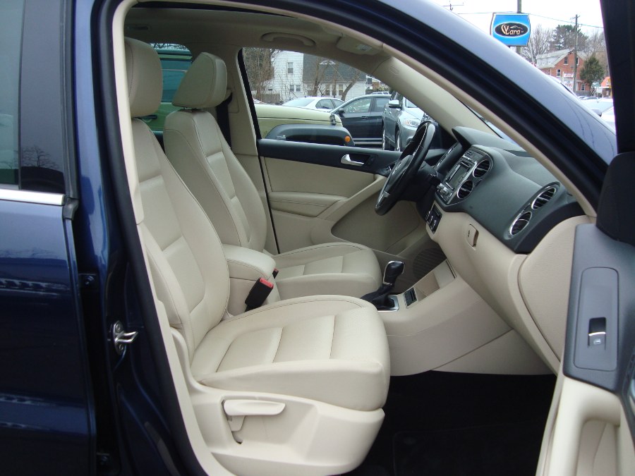 2012 Volkswagen Tiguan 4WD 4dr Auto SE w/Sunroof & Nav, available for sale in Manchester, Connecticut | Yara Motors. Manchester, Connecticut 2012 Volkswagen Tiguan 4WD 4dr Auto SE w/Sunroof & Nav, available for sale in Manchester, Connecticut | Yara Motors. Manchester, Connecticut