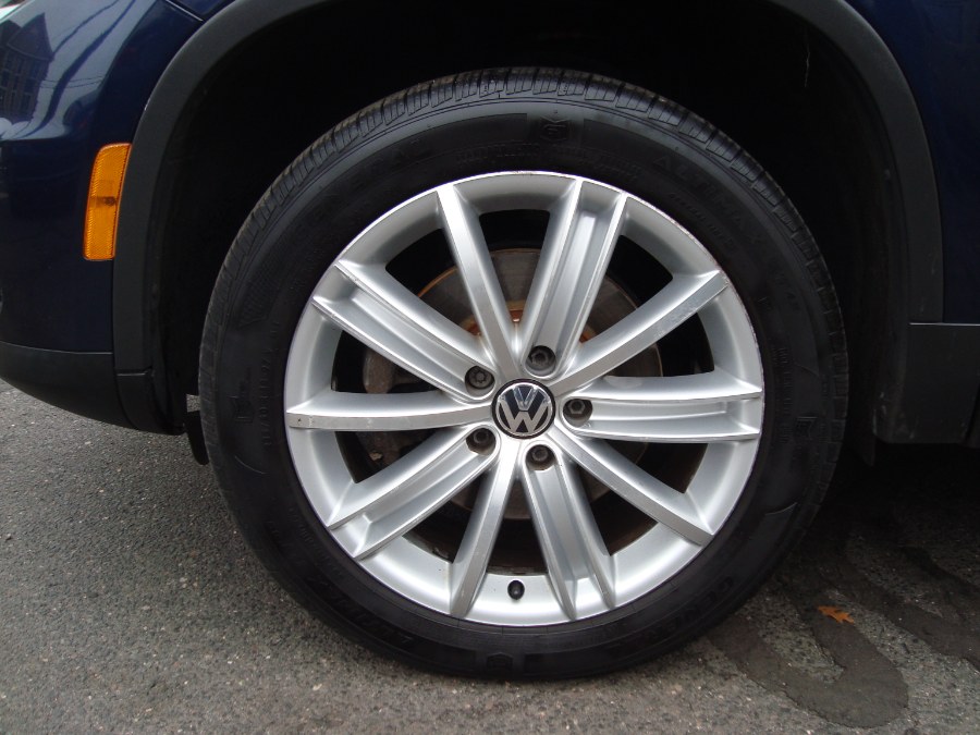 2012 Volkswagen Tiguan 4WD 4dr Auto SE w/Sunroof & Nav, available for sale in Manchester, Connecticut | Yara Motors. Manchester, Connecticut 2012 Volkswagen Tiguan 4WD 4dr Auto SE w/Sunroof & Nav, available for sale in Manchester, Connecticut | Yara Motors. Manchester, Connecticut