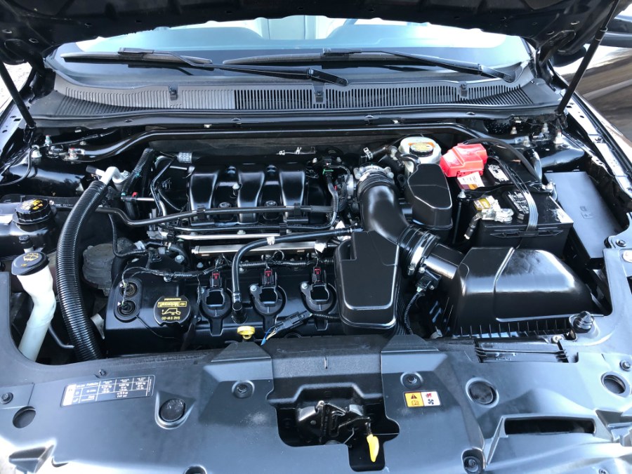 2013 Ford Taurus SEL Leather Sunroof Navi LOADED, available for sale in East Windsor, Connecticut | Toro Auto. East Windsor, Connecticut 2013 Ford Taurus SEL Leather Sunroof Navi LOADED, available for sale in East Windsor, Connecticut | Toro Auto. East Windsor, Connecticut