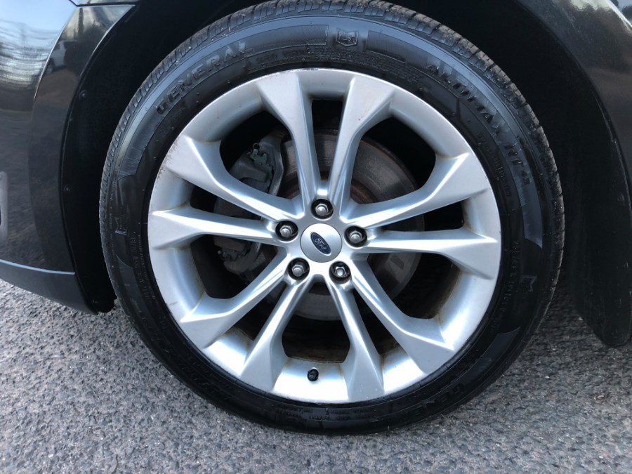 2013 Ford Taurus SEL Leather Sunroof Navi LOADED, available for sale in East Windsor, Connecticut | Toro Auto. East Windsor, Connecticut 2013 Ford Taurus SEL Leather Sunroof Navi LOADED, available for sale in East Windsor, Connecticut | Toro Auto. East Windsor, Connecticut