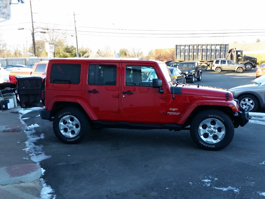 2012 Jeep Wrangler Unlimited 4WD 4dr Sahara, available for sale in Berlin, Connecticut | Action Automotive. Berlin, Connecticut 2012 Jeep Wrangler Unlimited 4WD 4dr Sahara, available for sale in Berlin, Connecticut | Action Automotive. Berlin, Connecticut