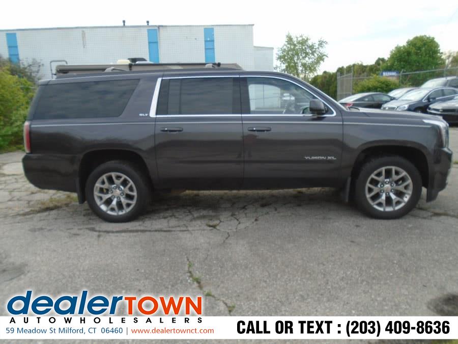 2015 GMC Yukon XL 4WD 4dr SLT, available for sale in Milford, Connecticut | Dealertown Auto Wholesalers. Milford, Connecticut
