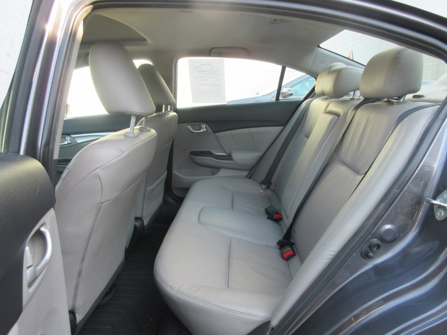 The 2015 Honda CIVIC SEDAN 4dr CVT EX-L
