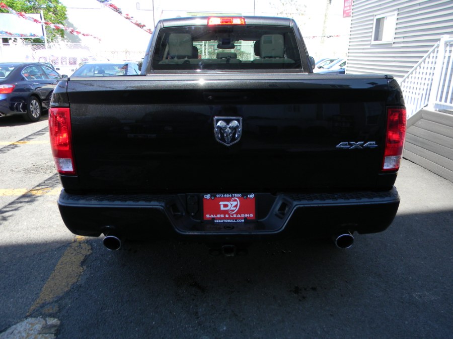 2015 Ram 1500 4WD Quad Cab 140.5" Express, available for sale in Paterson, New Jersey | DZ Automall. Paterson, New Jersey 2015 Ram 1500 4WD Quad Cab 140.5" Express, available for sale in Paterson, New Jersey | DZ Automall. Paterson, New Jersey