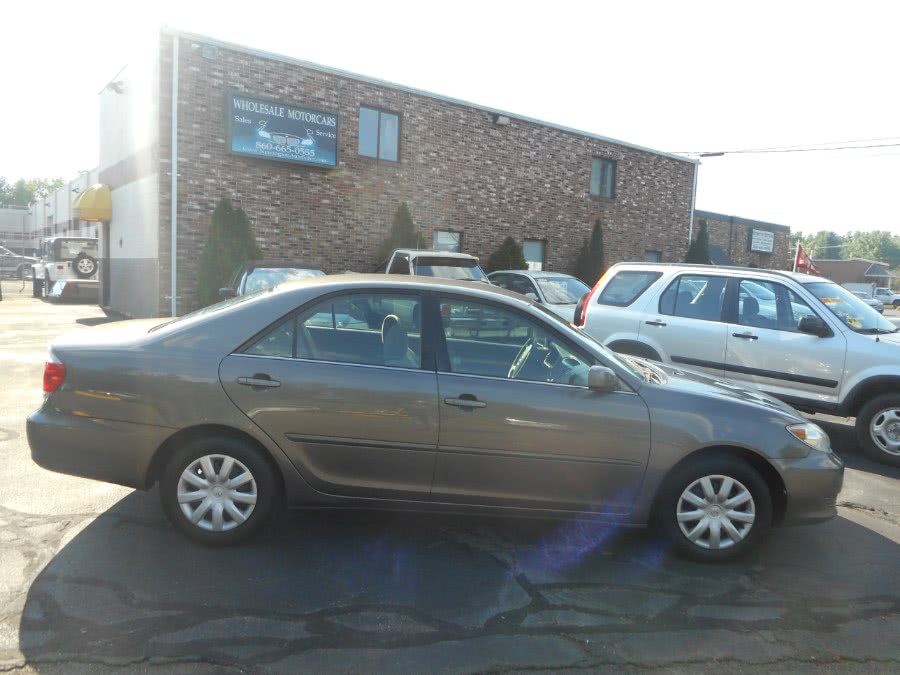 2005 Toyota Camry 4dr Sdn LE Auto, available for sale in Newington, Connecticut | Wholesale Motorcars LLC. Newington, Connecticut