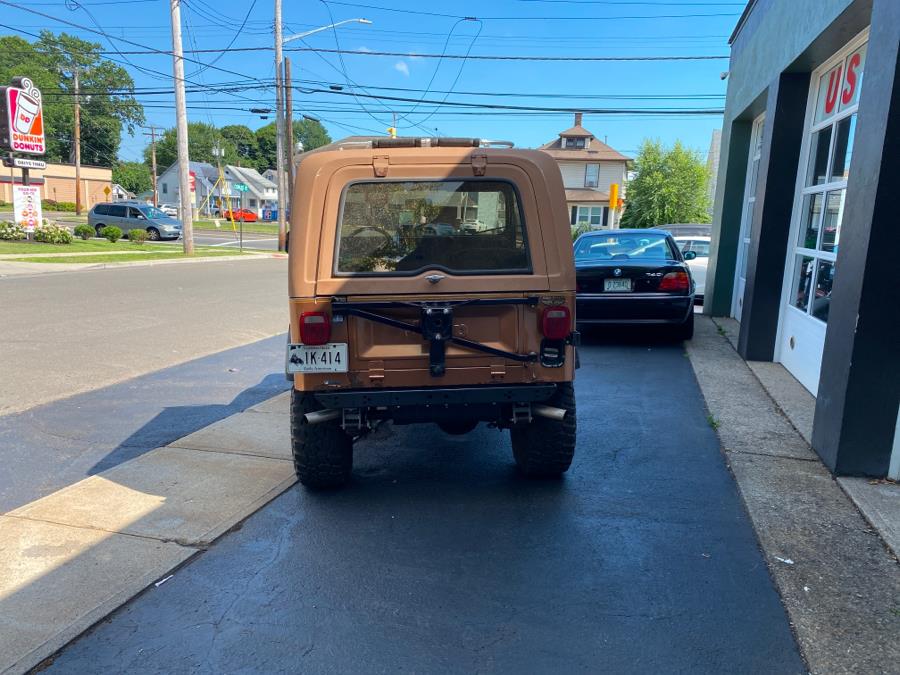 1979 Jeep CJ7 Wrangler Golden Eagle, available for sale in Milford, Connecticut | Village Auto Sales. Milford, Connecticut 1979 Jeep CJ7 Wrangler Golden Eagle, available for sale in Milford, Connecticut | Village Auto Sales. Milford, Connecticut