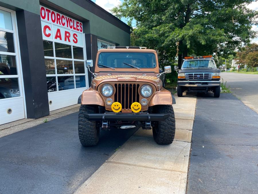 1979 Jeep CJ7 Wrangler Golden Eagle, available for sale in Milford, Connecticut | Village Auto Sales. Milford, Connecticut 1979 Jeep CJ7 Wrangler Golden Eagle, available for sale in Milford, Connecticut | Village Auto Sales. Milford, Connecticut