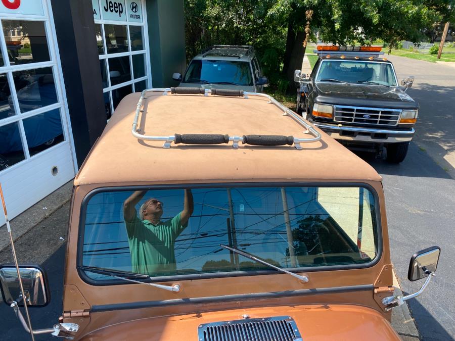 1979 Jeep CJ7 Wrangler Golden Eagle, available for sale in Milford, Connecticut | Village Auto Sales. Milford, Connecticut 1979 Jeep CJ7 Wrangler Golden Eagle, available for sale in Milford, Connecticut | Village Auto Sales. Milford, Connecticut