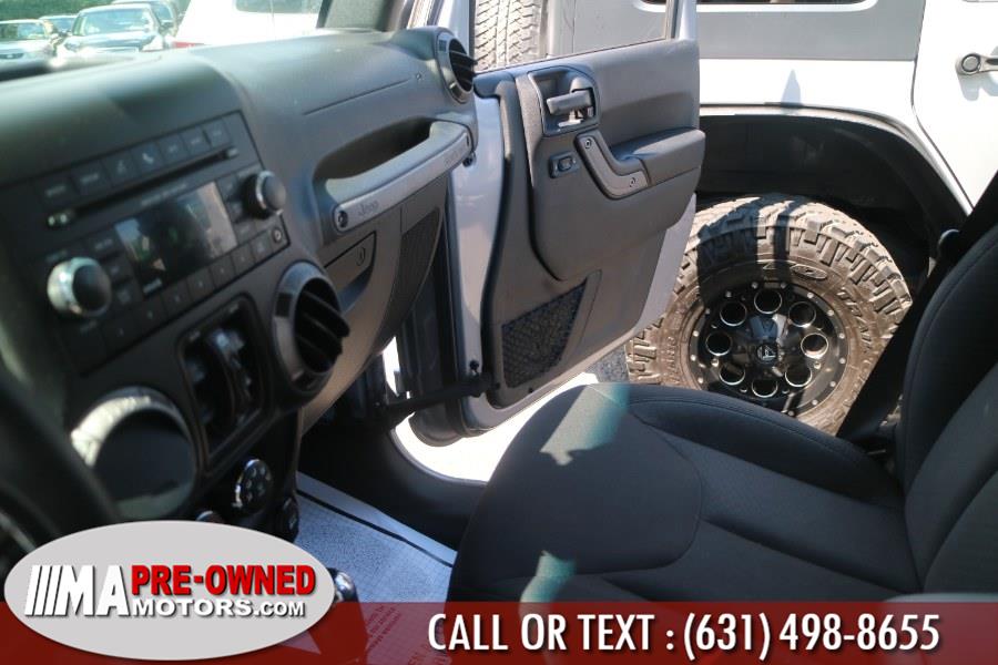 2016 Jeep Wrangler Unlimited 4WD 4dr Sport, available for sale in Huntington Station, New York | M & A Motors. Huntington Station, New York 2016 Jeep Wrangler Unlimited 4WD 4dr Sport, available for sale in Huntington Station, New York | M & A Motors. Huntington Station, New York