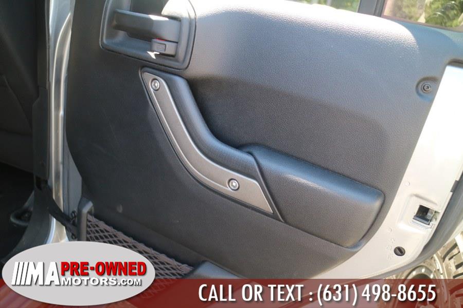 2016 Jeep Wrangler Unlimited 4WD 4dr Sport, available for sale in Huntington Station, New York | M & A Motors. Huntington Station, New York 2016 Jeep Wrangler Unlimited 4WD 4dr Sport, available for sale in Huntington Station, New York | M & A Motors. Huntington Station, New York