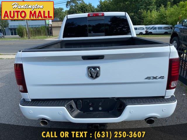 2014 Ram 1500 4WD Crew Cab 140.5" Sport, available for sale in Huntington Station, New York | Huntington Auto Mall. Huntington Station, New York 2014 Ram 1500 4WD Crew Cab 140.5" Sport, available for sale in Huntington Station, New York | Huntington Auto Mall. Huntington Station, New York