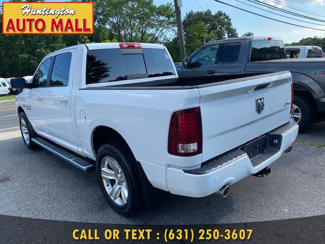 2014 Ram 1500 4WD Crew Cab 140.5" Sport, available for sale in Huntington Station, New York | Huntington Auto Mall. Huntington Station, New York 2014 Ram 1500 4WD Crew Cab 140.5" Sport, available for sale in Huntington Station, New York | Huntington Auto Mall. Huntington Station, New York