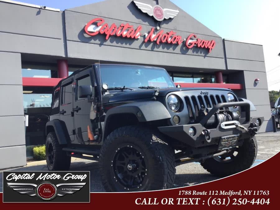 Used Jeep Wrangler Unlimited 4WD 4dr Sport 2014 | Capital Motor Group Inc. Medford, New York