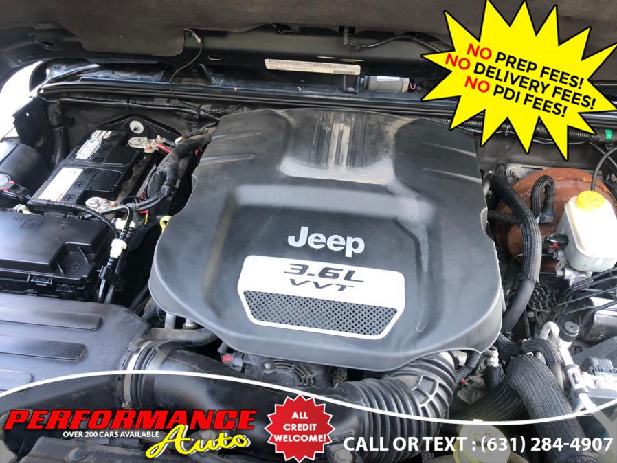 2012 Jeep Wrangler Unlimited 4WD 4dr Sahara, available for sale in Bohemia, New York | Performance Auto Inc. Bohemia, New York 2012 Jeep Wrangler Unlimited 4WD 4dr Sahara, available for sale in Bohemia, New York | Performance Auto Inc. Bohemia, New York